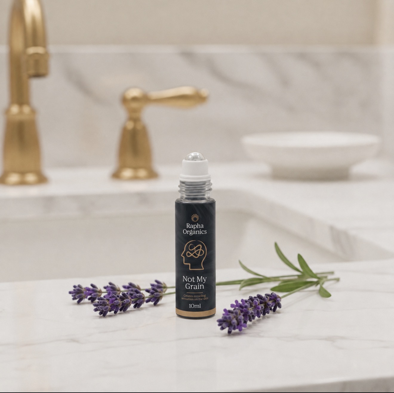 Not My Grain 10ml botanical roll-on beside lavender on a marble surface
